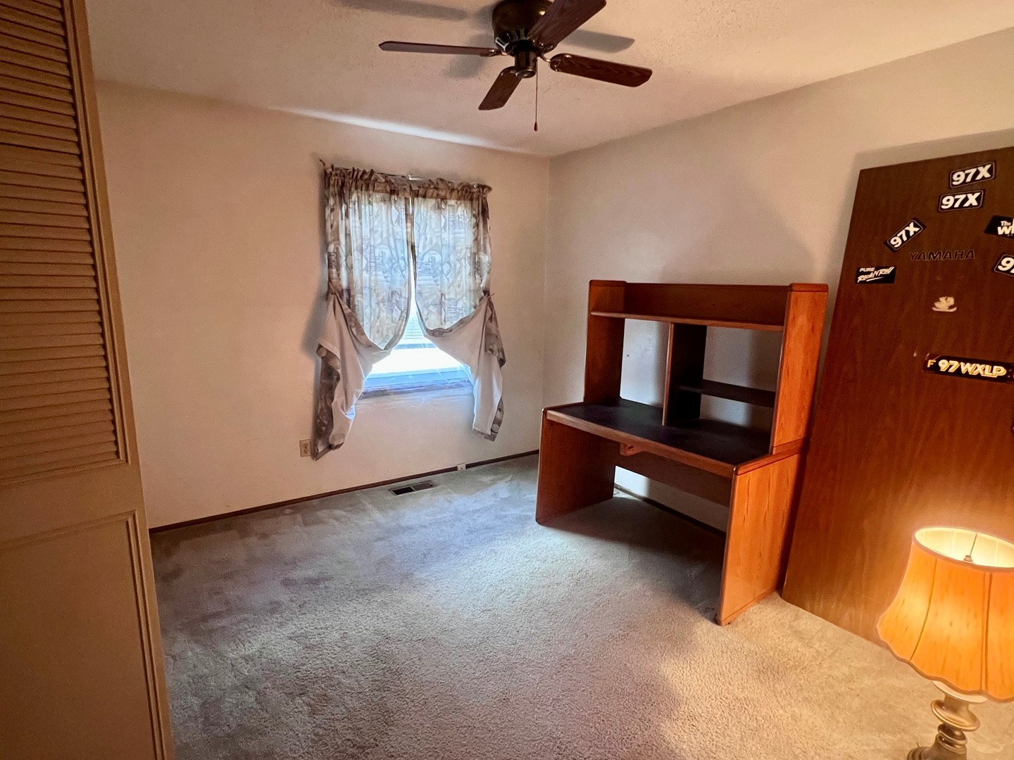 26899 Knief Road Rock Falls, IL 61071 - Photo 6 of 14 an empty room with windows and ceiling fan