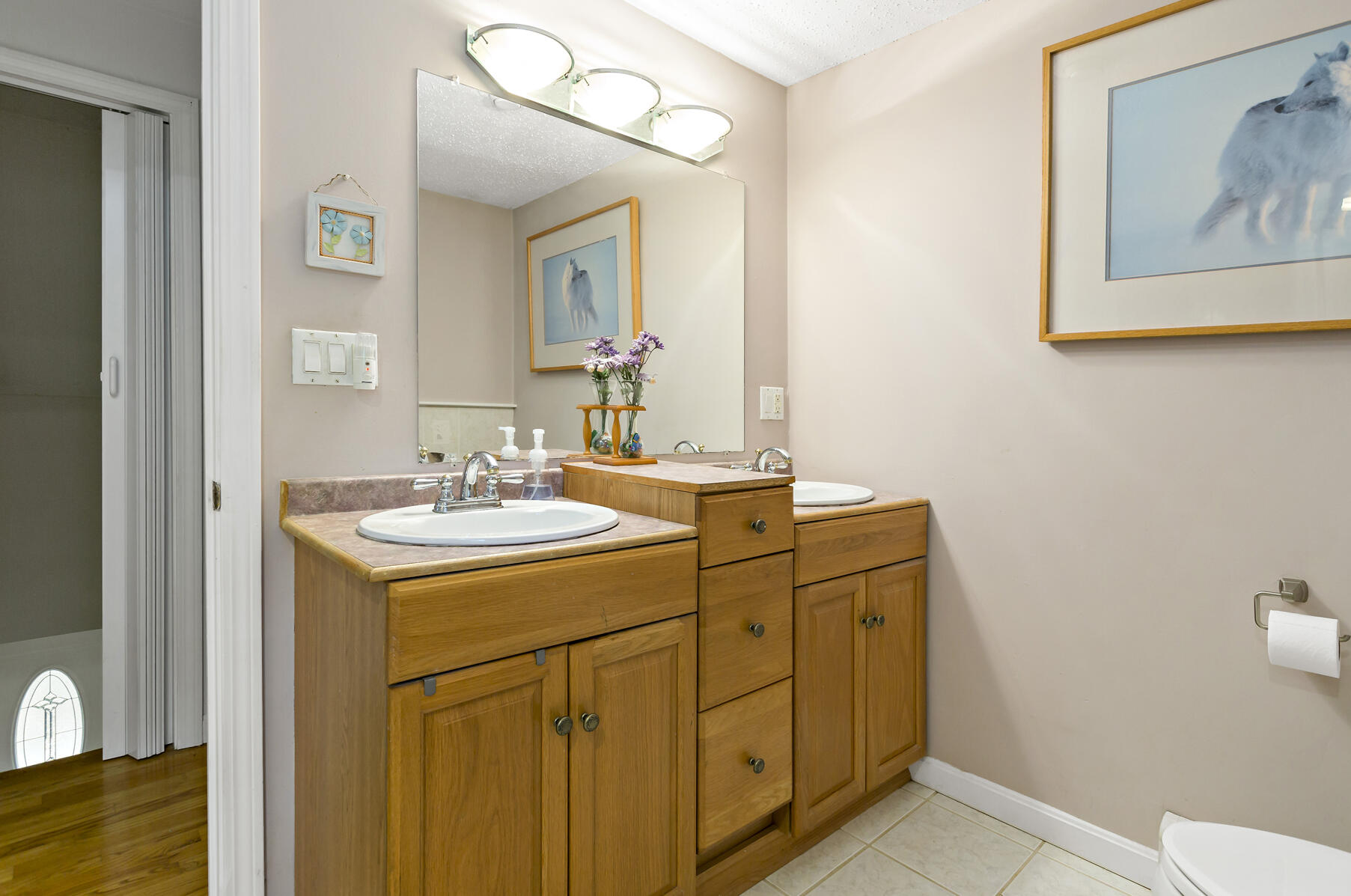 58 Saddleback Road Mashpee, MA 02649 - Photo 19 of 40 a bathroom with a sink mirror and vanity