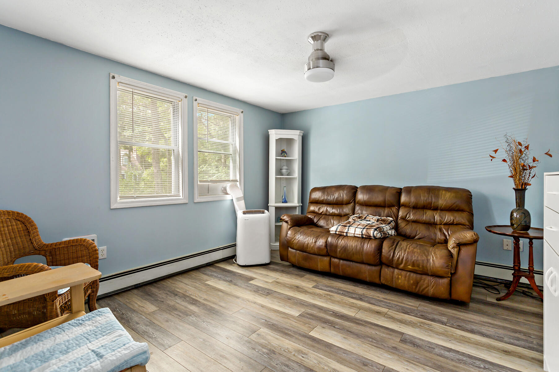 58 Saddleback Road Mashpee, MA 02649 - Photo 26 of 40 a living room with furniture and wooden floor
