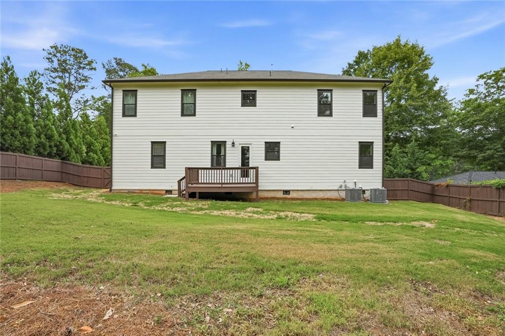 2415 West Rugby Avenue Atlanta, GA 30337 - Photo 39 of 40 a view of a house with a yard