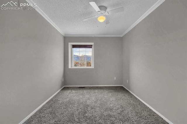 4415 Fencer Road Colorado Springs, CO 80911 - Photo 21 of 27 Upper level flex room off bedroom-bring your ideas!