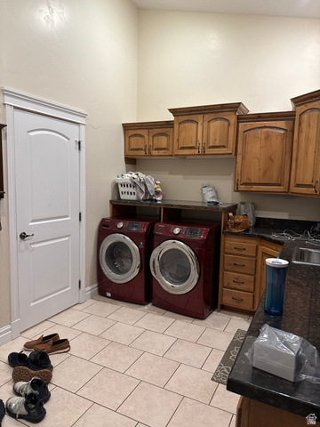 3145 South 500 West Vernal, UT 84078 - Photo 18 of 64 Laundry room featuring separate washer and dryer, light tile patterned flooring, and cabinet space