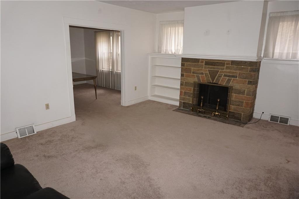 3853 Brighton Road Pittsburgh, PA 15212 - Photo 6 of 19 Living room and separate dining room.