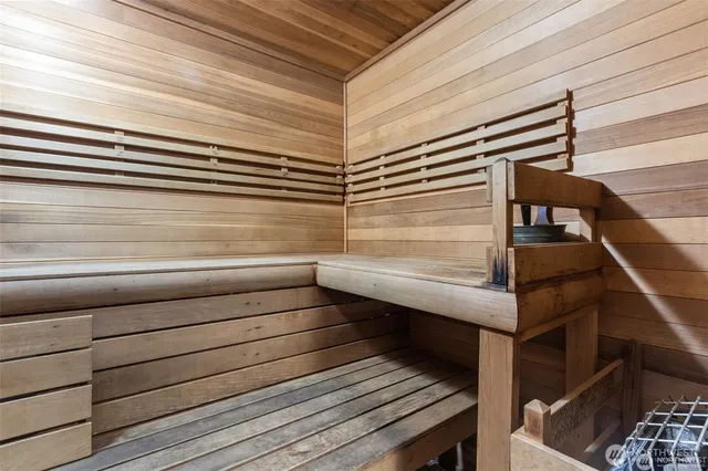 a view of a patio with a table and chairs