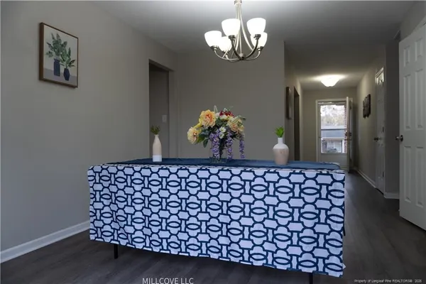 a vase of flowers sitting on a table