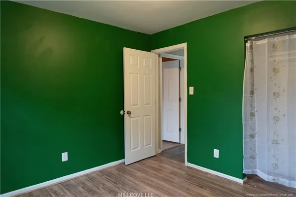 a front view of a house with yard