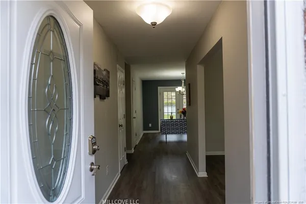 a view of a livingroom from a hallway