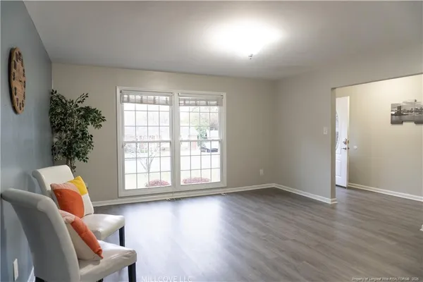 a view of livingroom with furniture and wooden floor