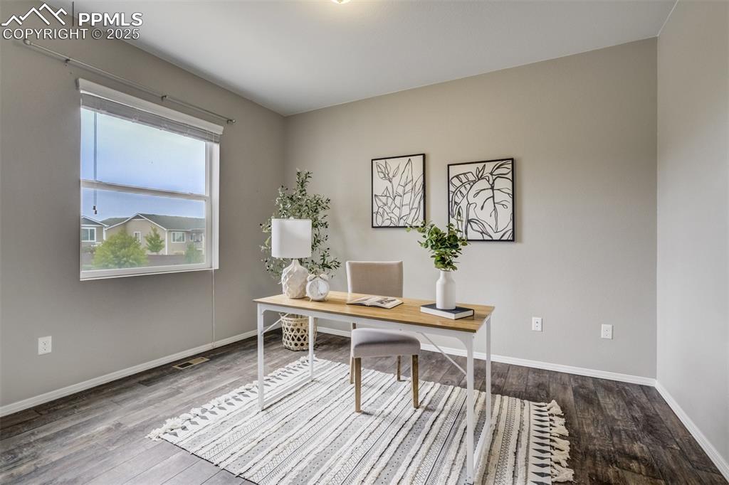 3410 Daydreamer Drive Colorado Springs, CO 80908 - Photo 21 of 50 a workspace with wooden floor