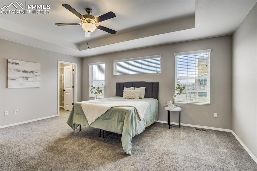 3410 Daydreamer Drive Colorado Springs, CO 80908 - Photo 23 of 50 a bedroom with a bed and a window