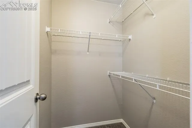 a view of a room with racks on the wall