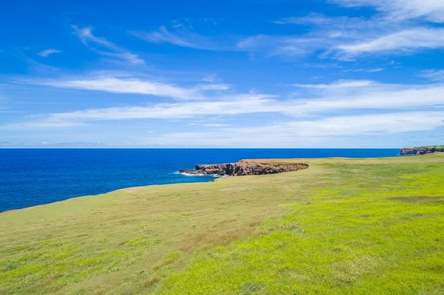 a view of an ocean from a balcony