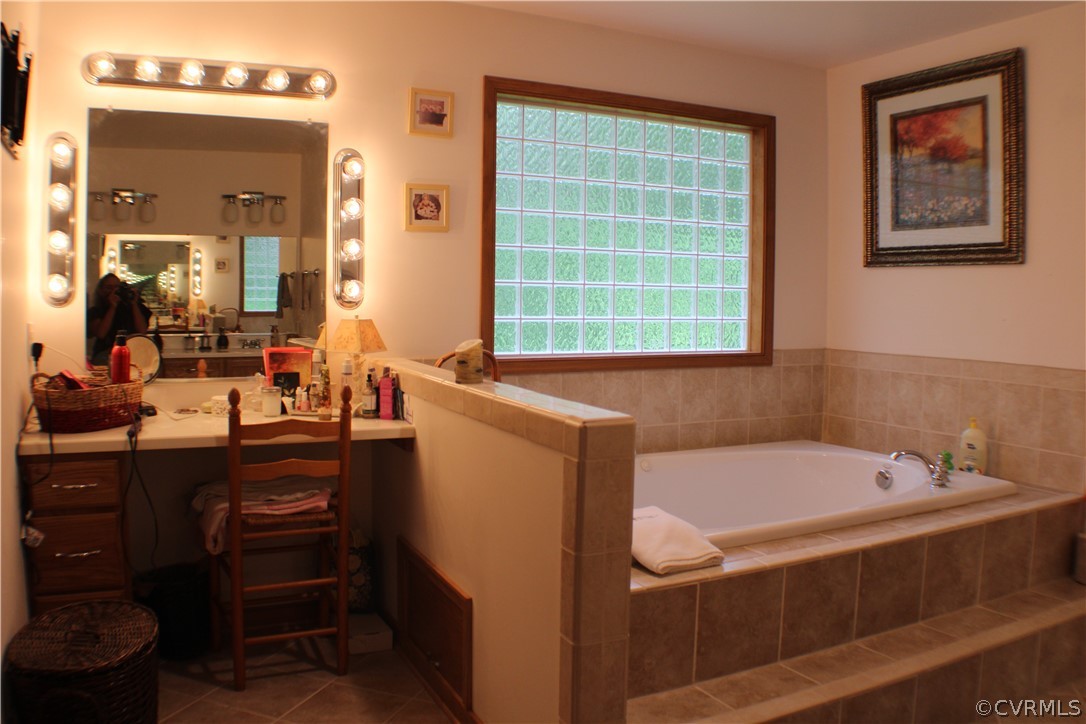 8901 Woodpecker Road Chesterfield, VA 23838 - Photo 26 of 46 Second floor primary bath with jetted tub, separat