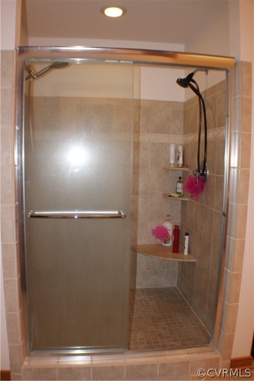 8901 Woodpecker Road Chesterfield, VA 23838 - Photo 28 of 46 Second floor primary bath with jetted tub, separat