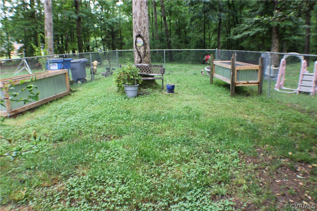 8901 Woodpecker Road Chesterfield, VA 23838 - Photo 36 of 46 Gorgeous backyard view! Separate fenced in area fo