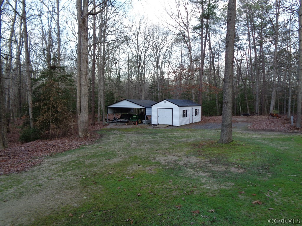 8901 Woodpecker Road Chesterfield, VA 23838 - Photo 41 of 46 View of the shed and covered carport for extra sto