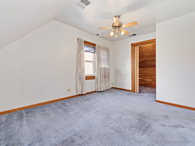 Undisclosed Address Chicago, IL 60613 - Photo 17 of 22 a view of an empty room with a window