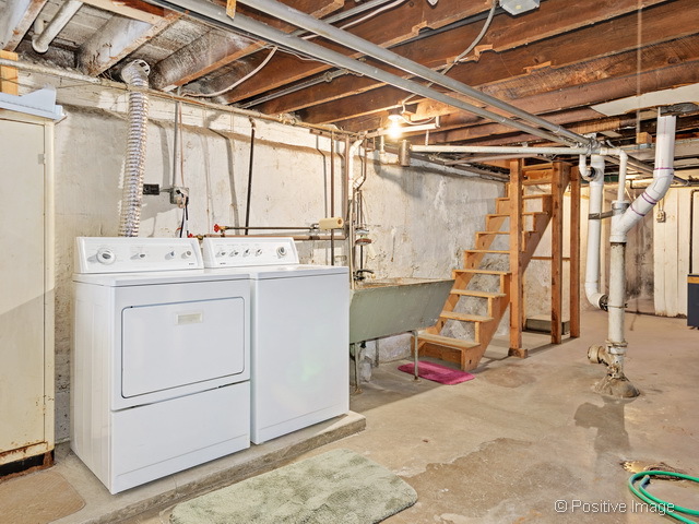 Undisclosed Address Chicago, IL 60613 - Photo 21 of 22 a utility room with dryer and washer