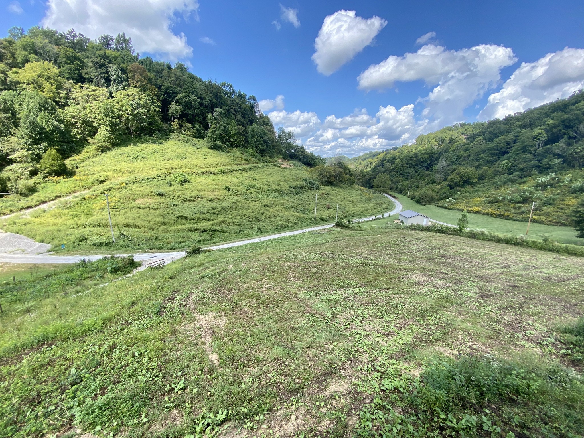 2528 Adamson Branch Road Liberty, TN 37095 - Photo 1 of 22 a view of a field with mountains in the background