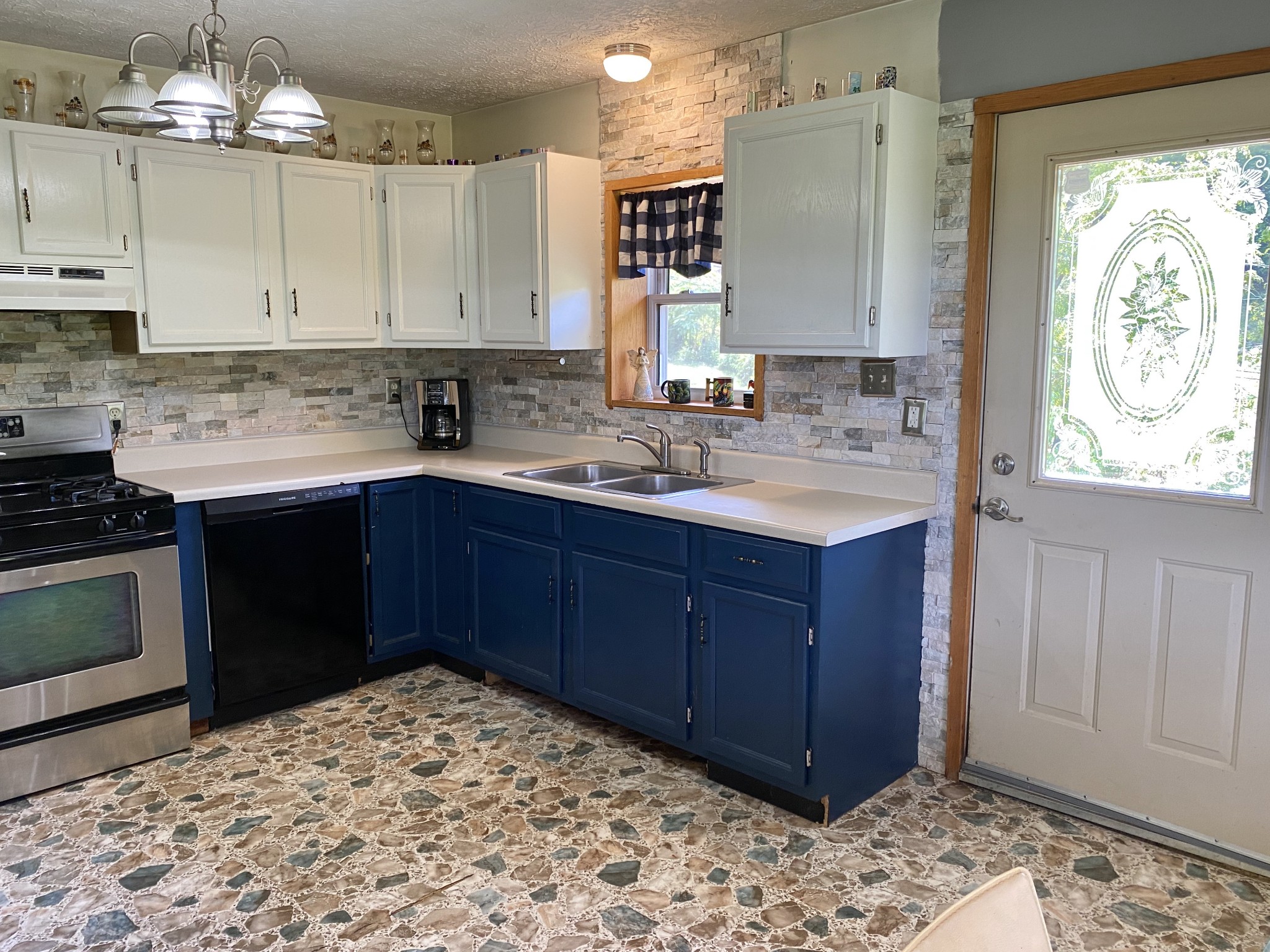 2528 Adamson Branch Road Liberty, TN 37095 - Photo 13 of 22 a kitchen with a sink and cabinets