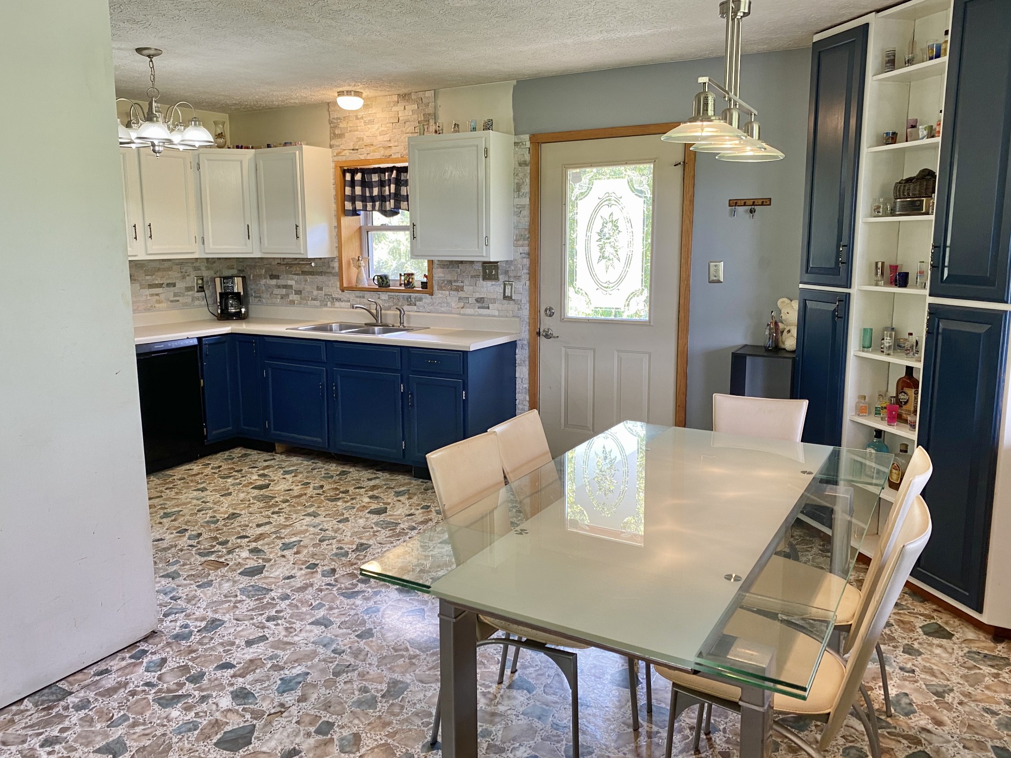 2528 Adamson Branch Road Liberty, TN 37095 - Photo 9 of 22 a kitchen with a table and chairs in it