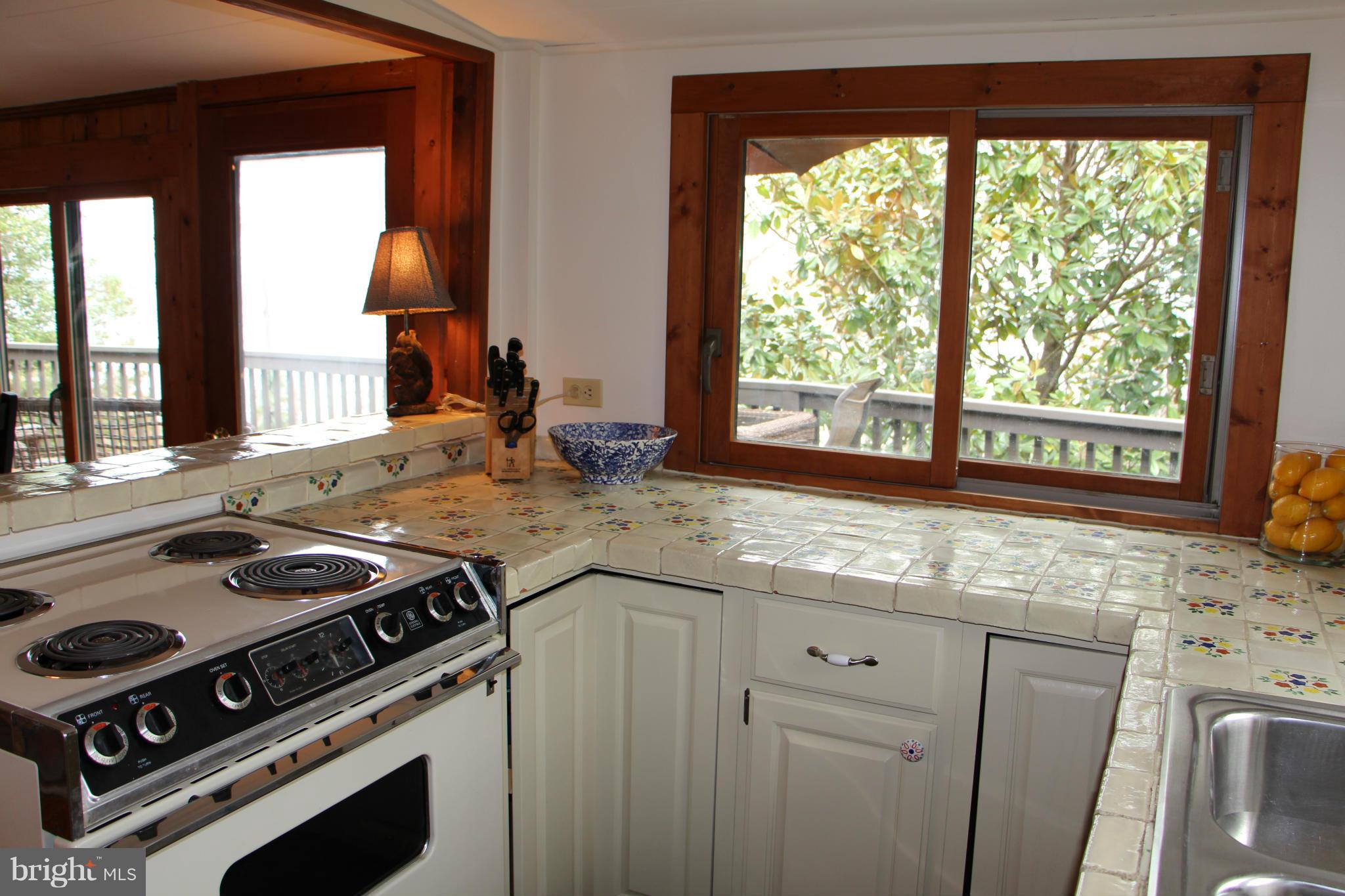 2168 Cedar Road Port Republic, MD 20676 - Photo 18 of 30 Charming kitchen open to family room