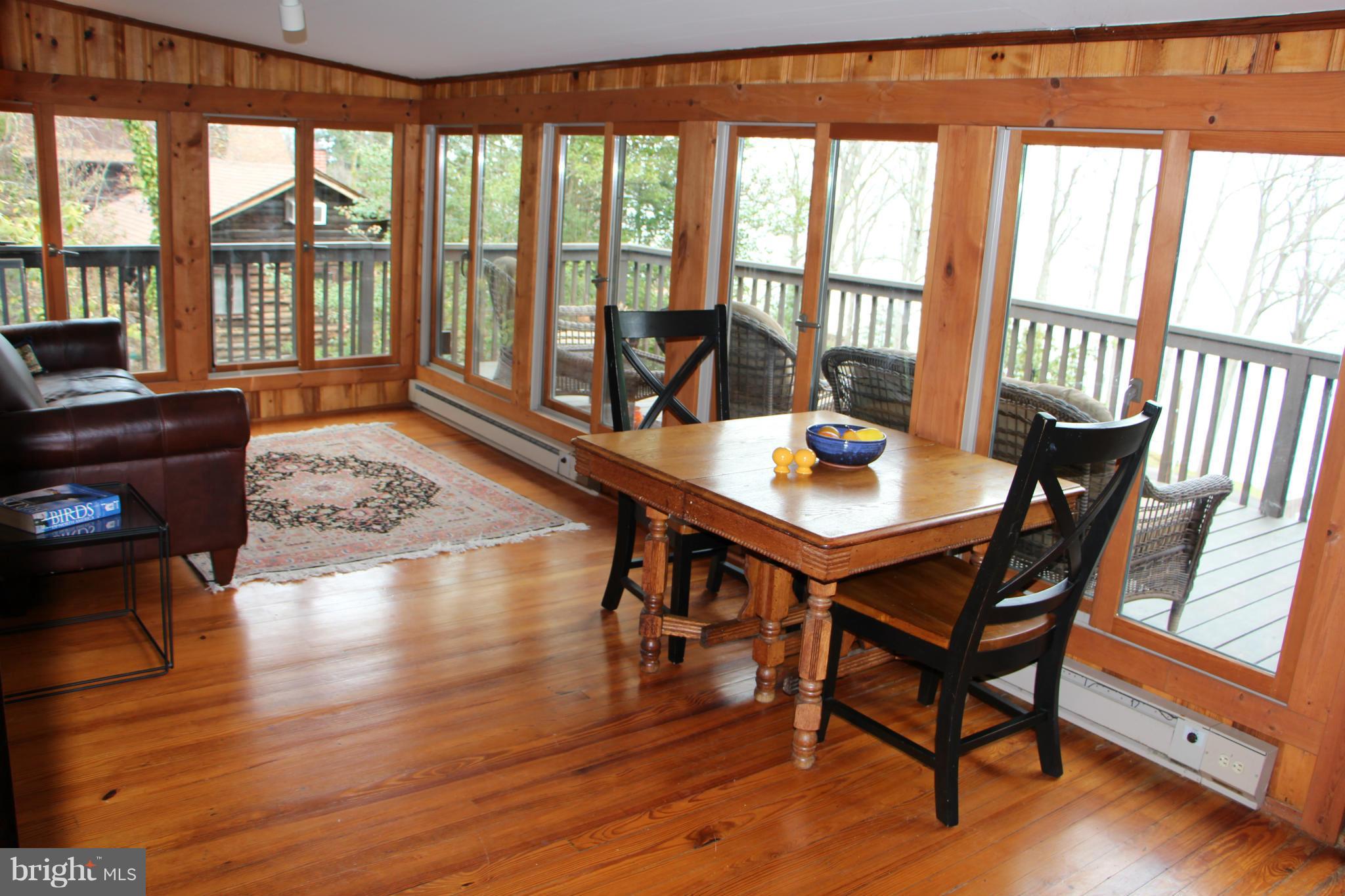 2168 Cedar Road Port Republic, MD 20676 - Photo 19 of 30 Floor-to-ceiling windows, gorgeous Bay view!