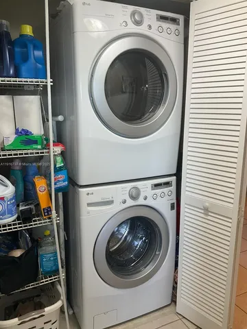 a view of a balcony with chairs