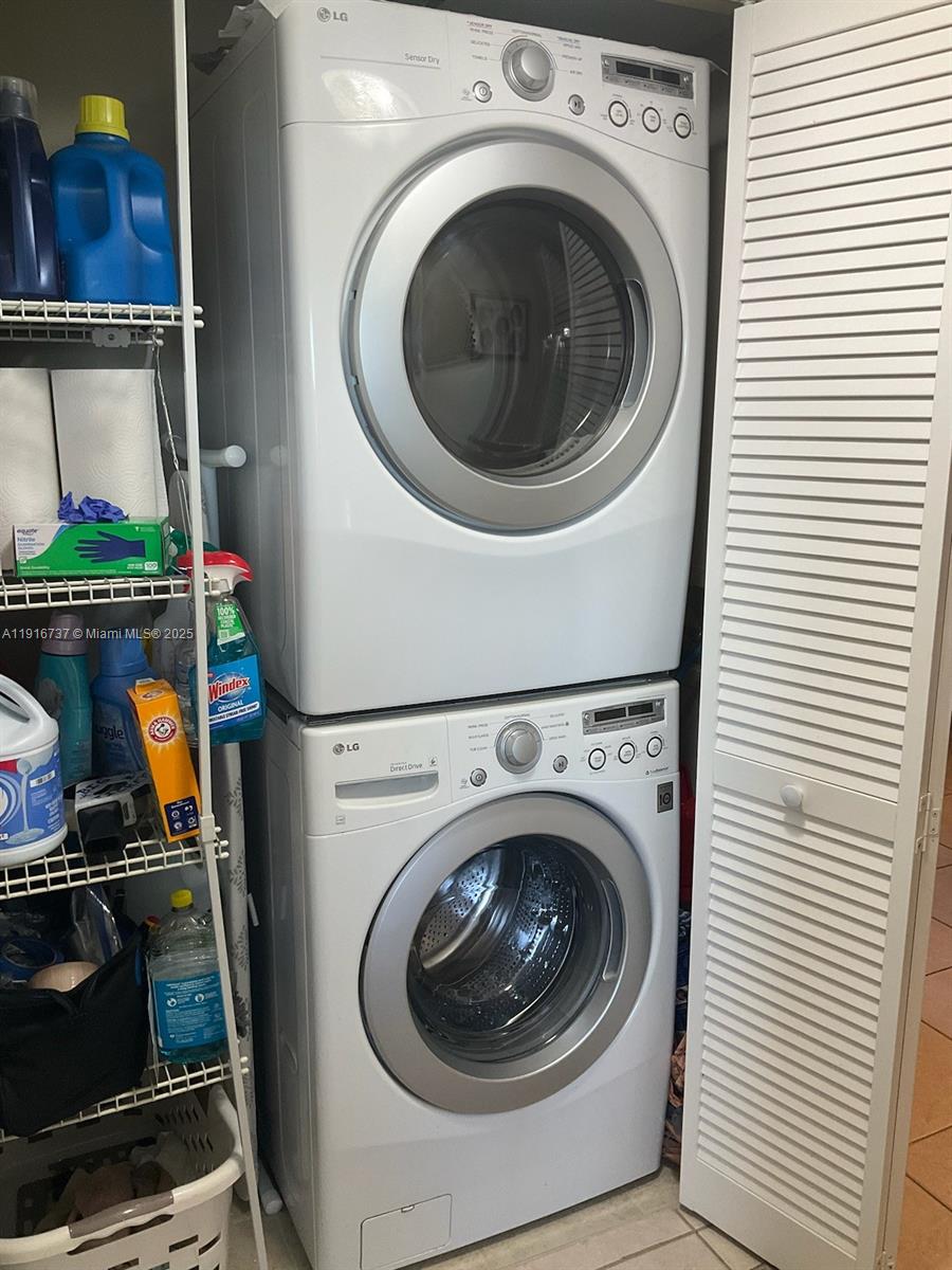 8730 Sherman Circle North, Unit 407 Miramar, FL 33025 - Photo 10 of 11 a utility room with dryer and washer
