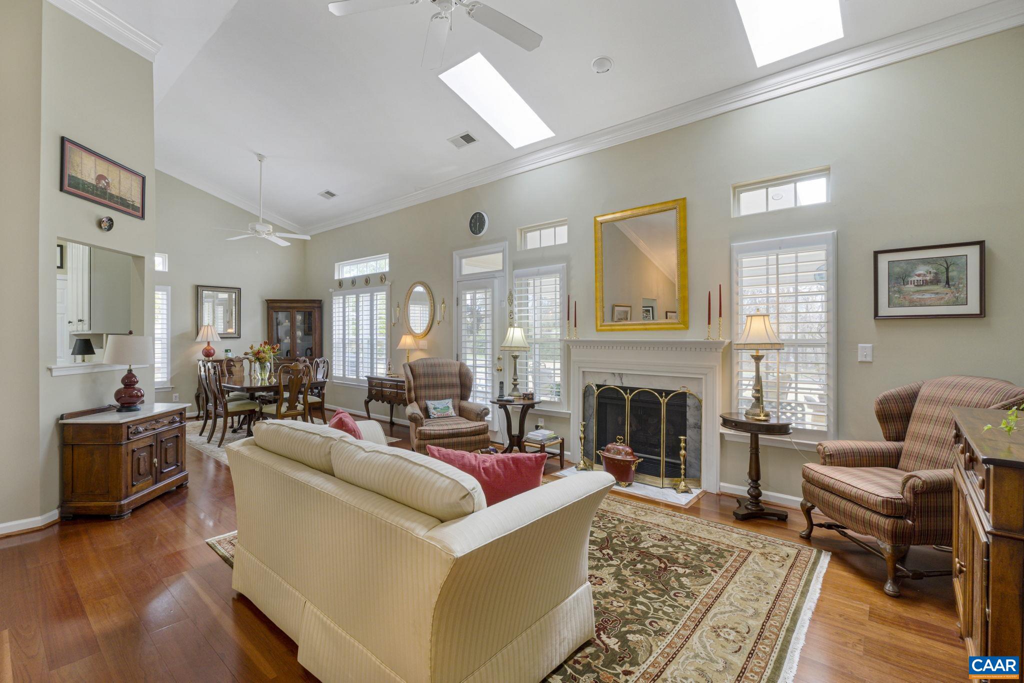 1673 Old Brook Road Charlottesville, VA 22901 - Photo 8 of 41 a living room with furniture and a fireplace