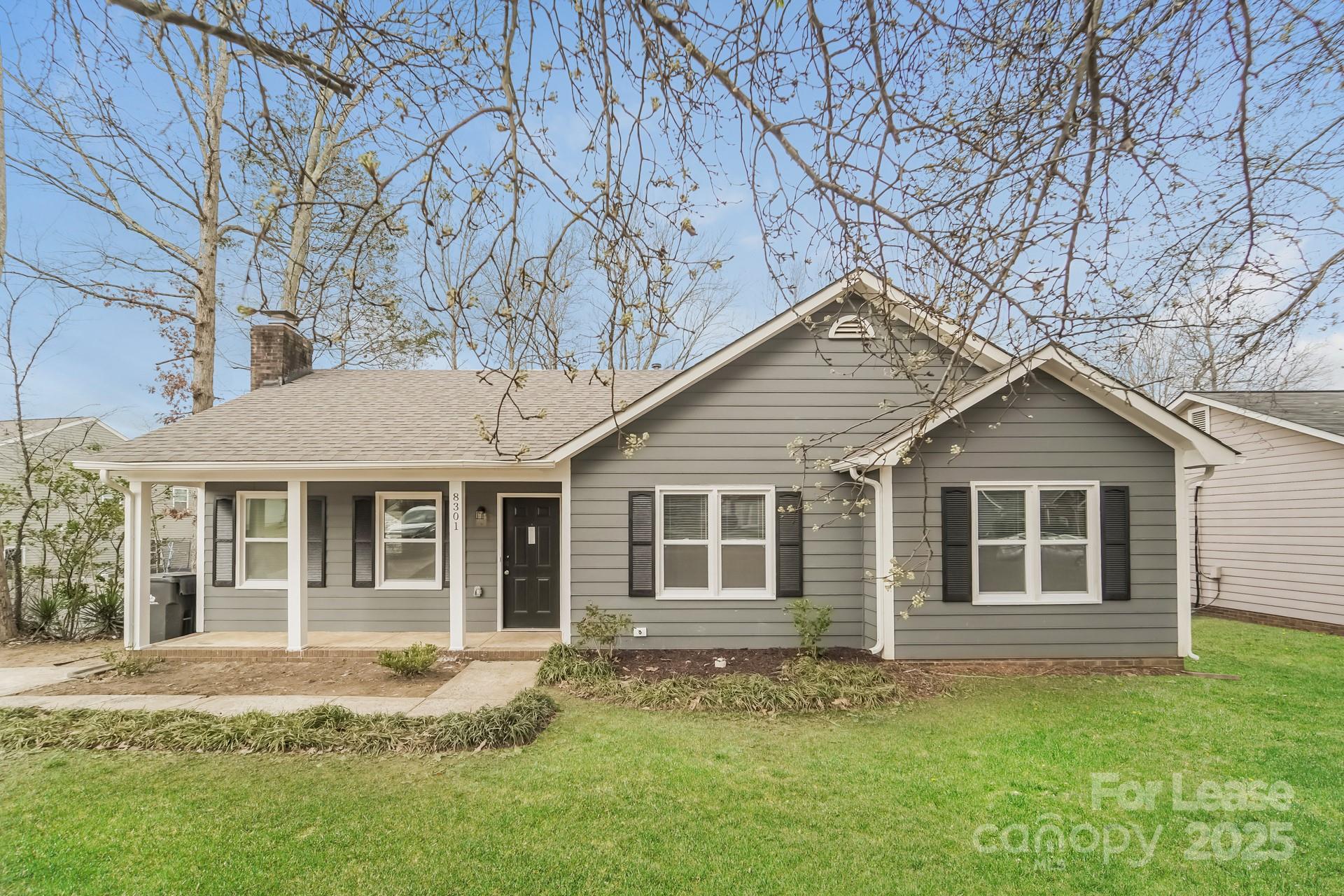 a house view with a garden space