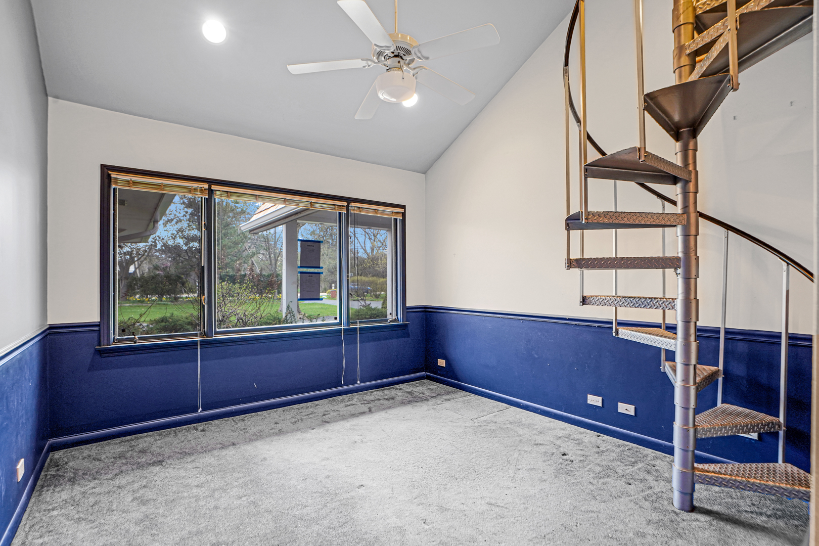 109 Sunset Ridge Road Northfield, IL 60093 - Photo 12 of 30 an empty room with windows and cabinet