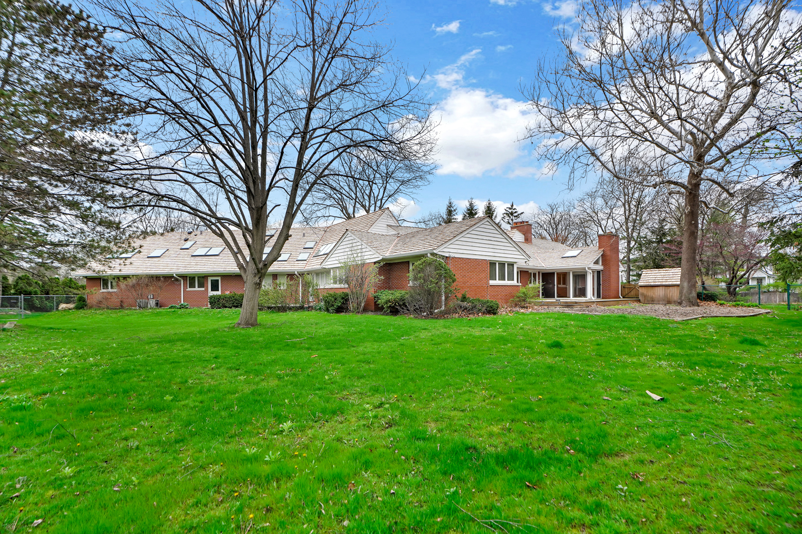 109 Sunset Ridge Road Northfield, IL 60093 - Photo 21 of 30 a view of a house with backyard and garden