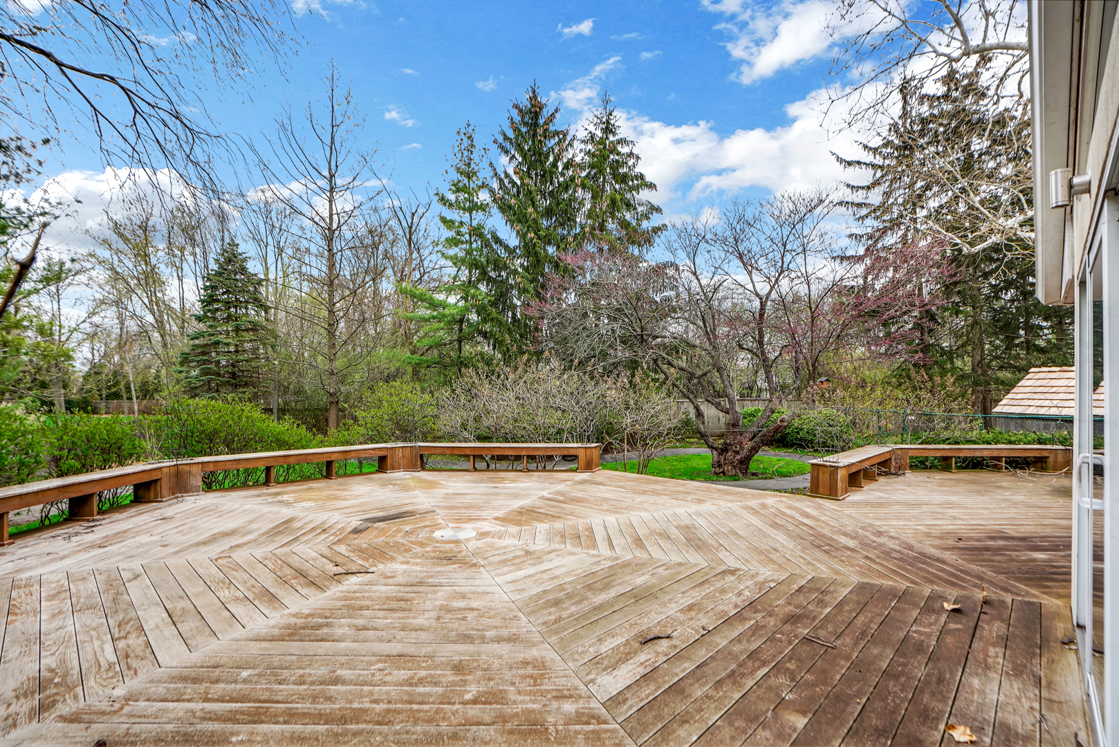 109 Sunset Ridge Road Northfield, IL 60093 - Photo 24 of 30 a view of outdoor space with swimming pool and trees in the background