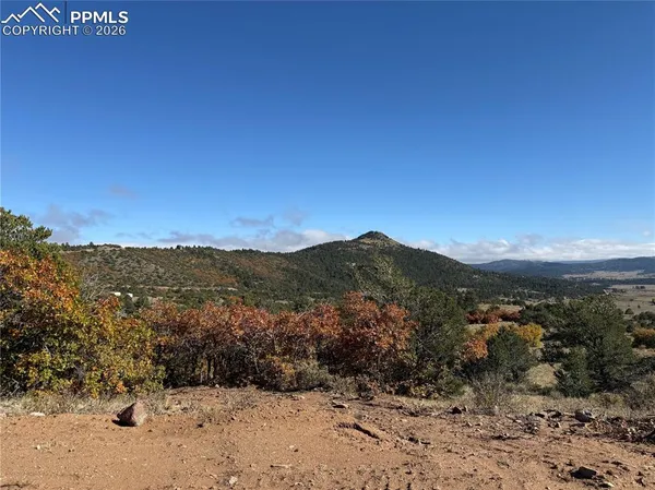 a view of mountain view with mountains in the background