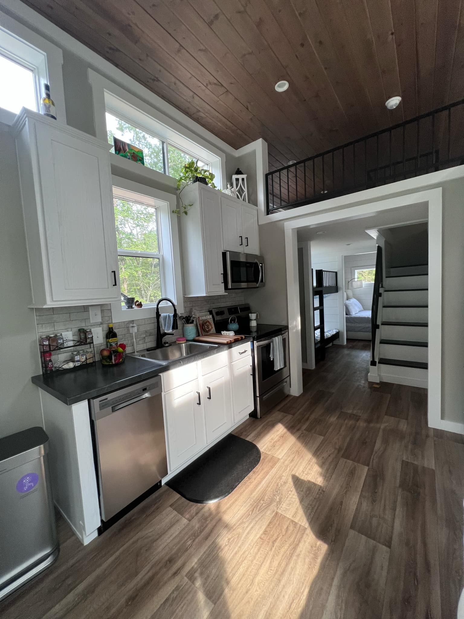 1530 Prince Road Big Sandy, TN 38221 - Photo 13 of 31 a open kitchen with stainless steel appliances granite countertop a stove a sink and a refrigerator