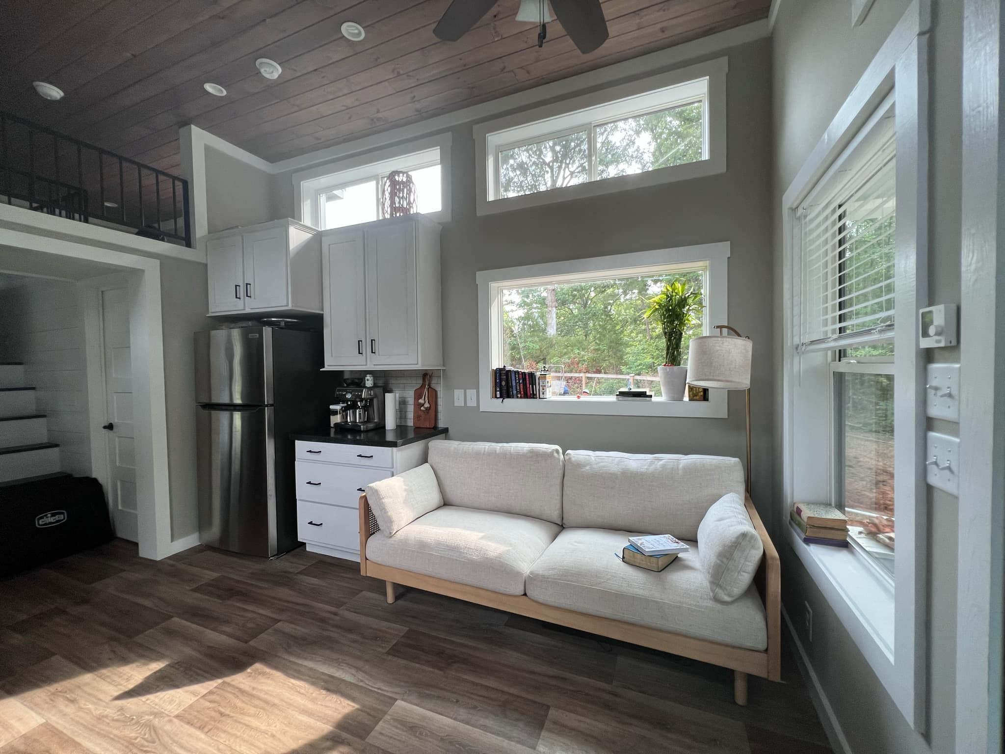 1530 Prince Road Big Sandy, TN 38221 - Photo 20 of 31 a living room with stainless steel appliances furniture and a large window