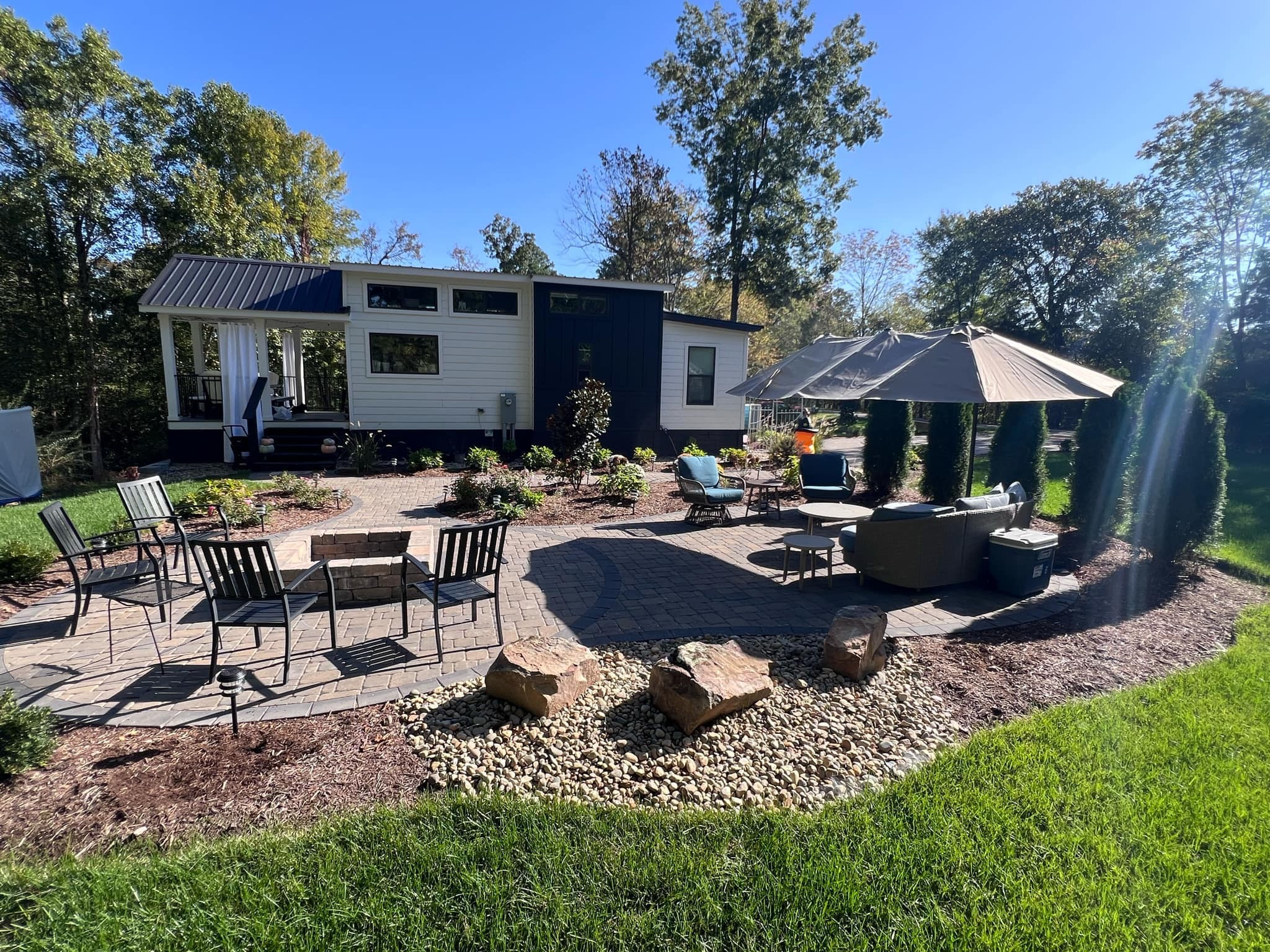 1530 Prince Road Big Sandy, TN 38221 - Photo 2 of 31 a swimming pool view with a seating space