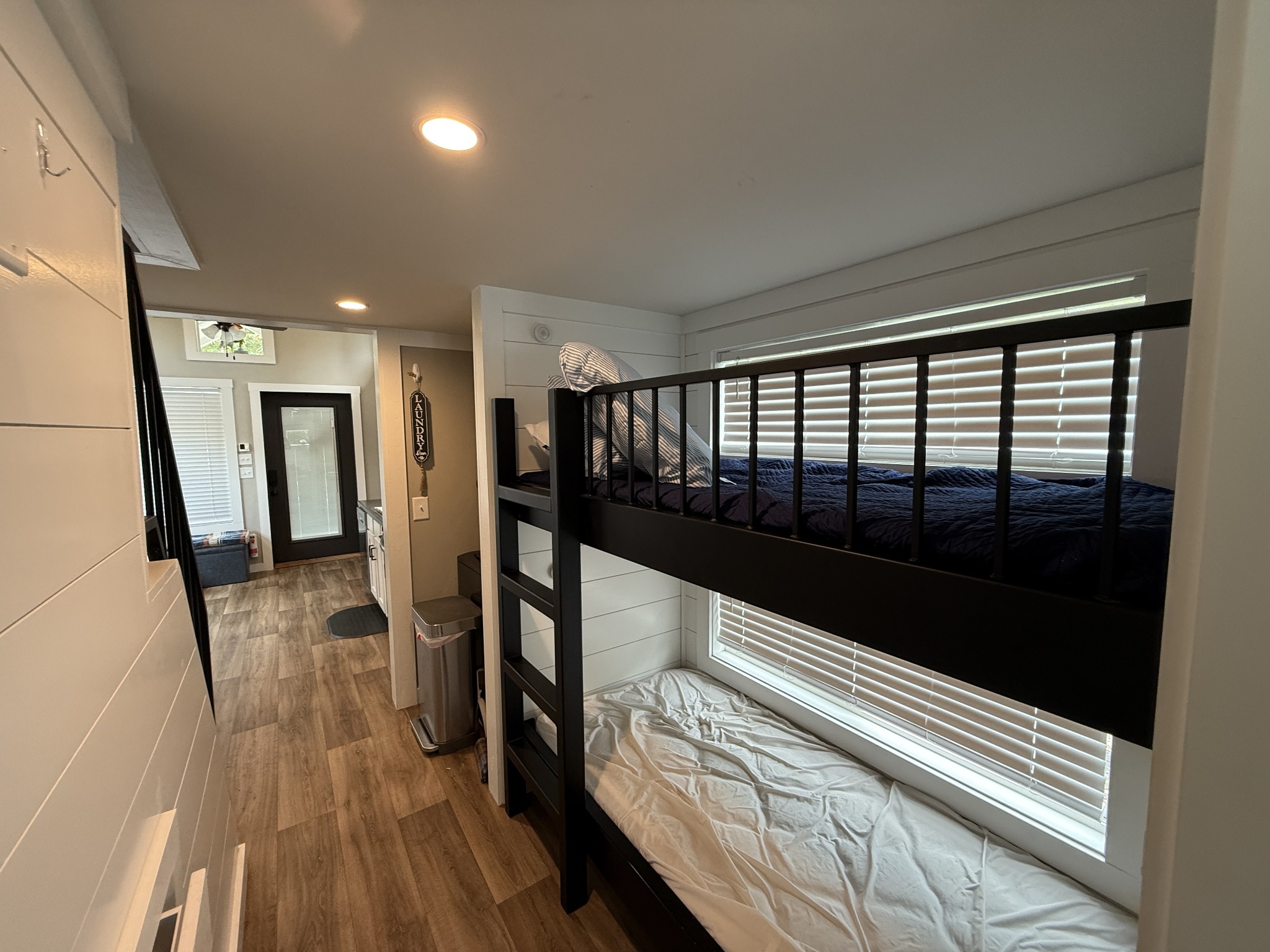 1530 Prince Road Big Sandy, TN 38221 - Photo 25 of 31 a view of hallway with wooden floor and staircase