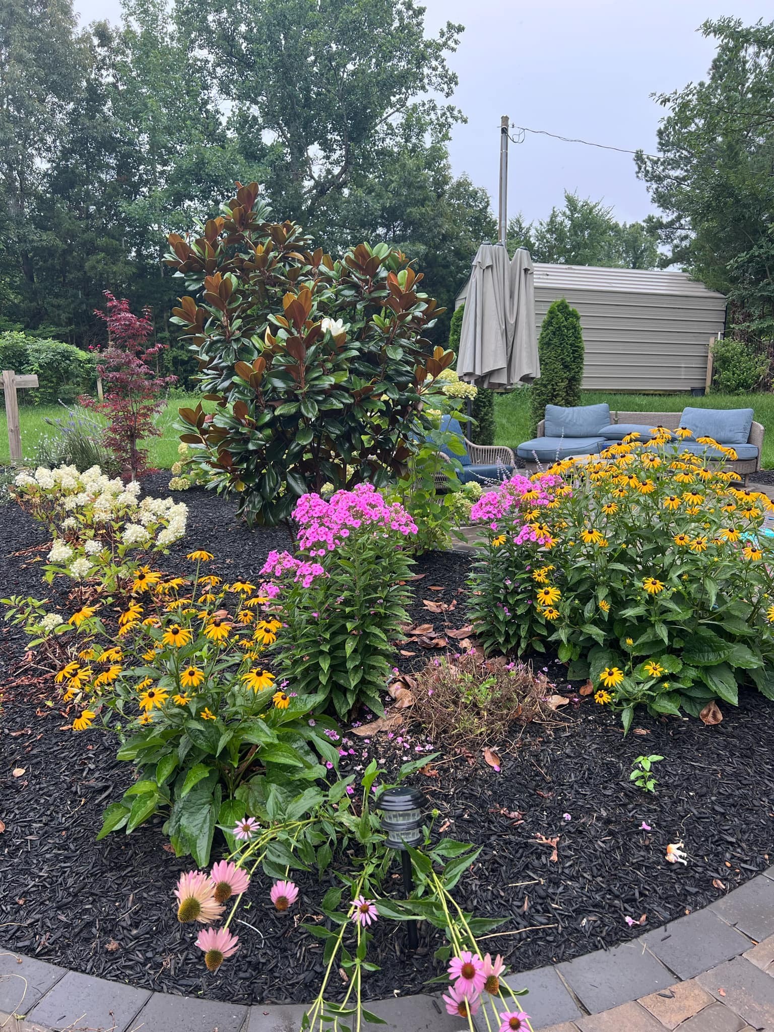 1530 Prince Road Big Sandy, TN 38221 - Photo 8 of 31 a backyard of a house with a tree