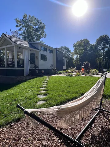 a view of a back yard of the house