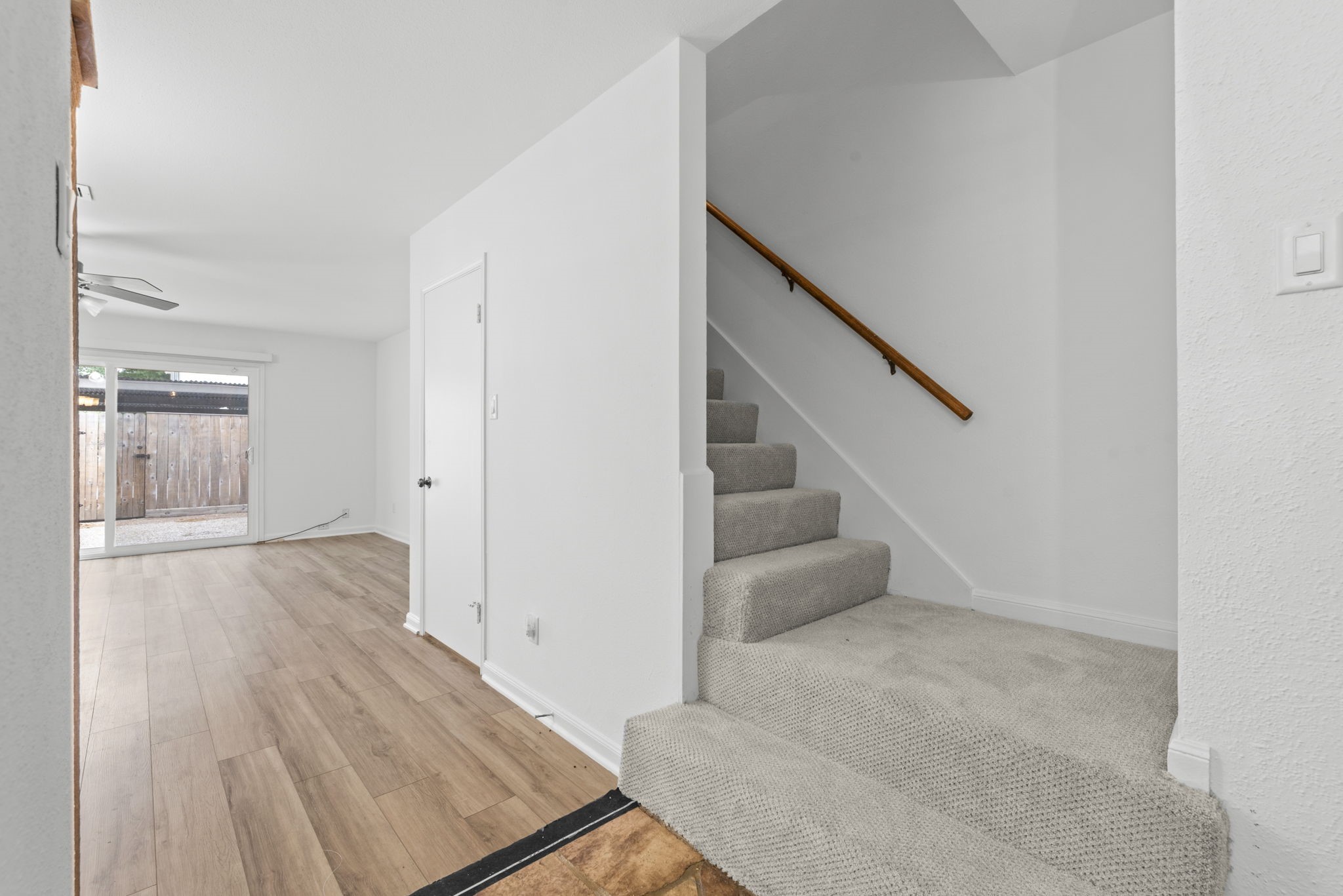 9668 Westview Drive, Unit 2 Houston, TX 77055 - Photo 17 of 34 a view of entryway and hall with wooden floor