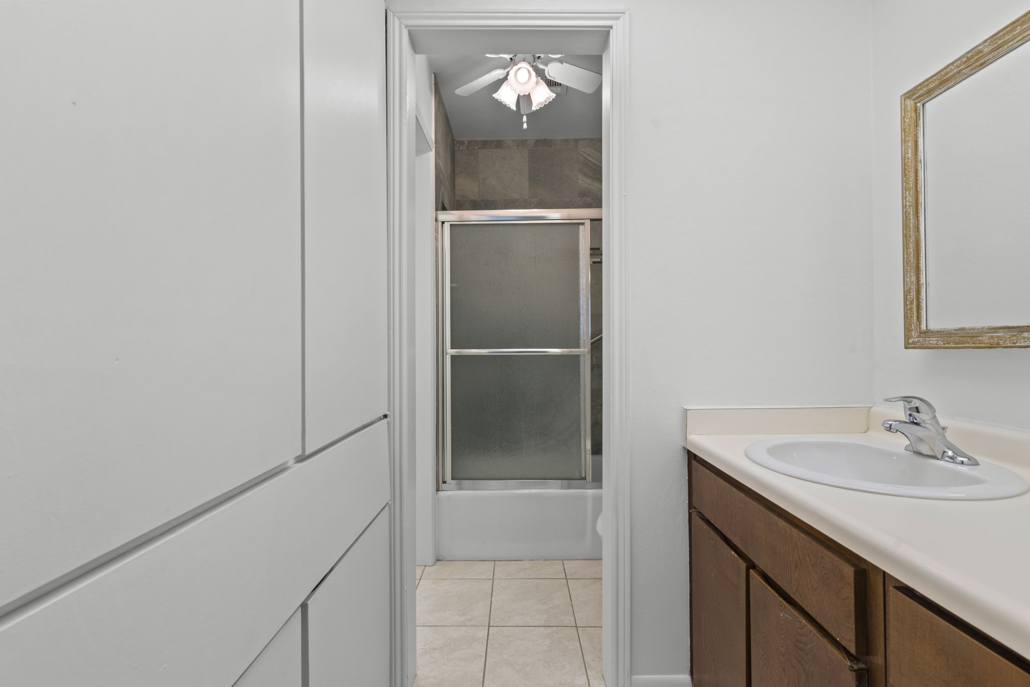 9668 Westview Drive, Unit 2 Houston, TX 77055 - Photo 21 of 34 a bathroom with a sink and a mirror