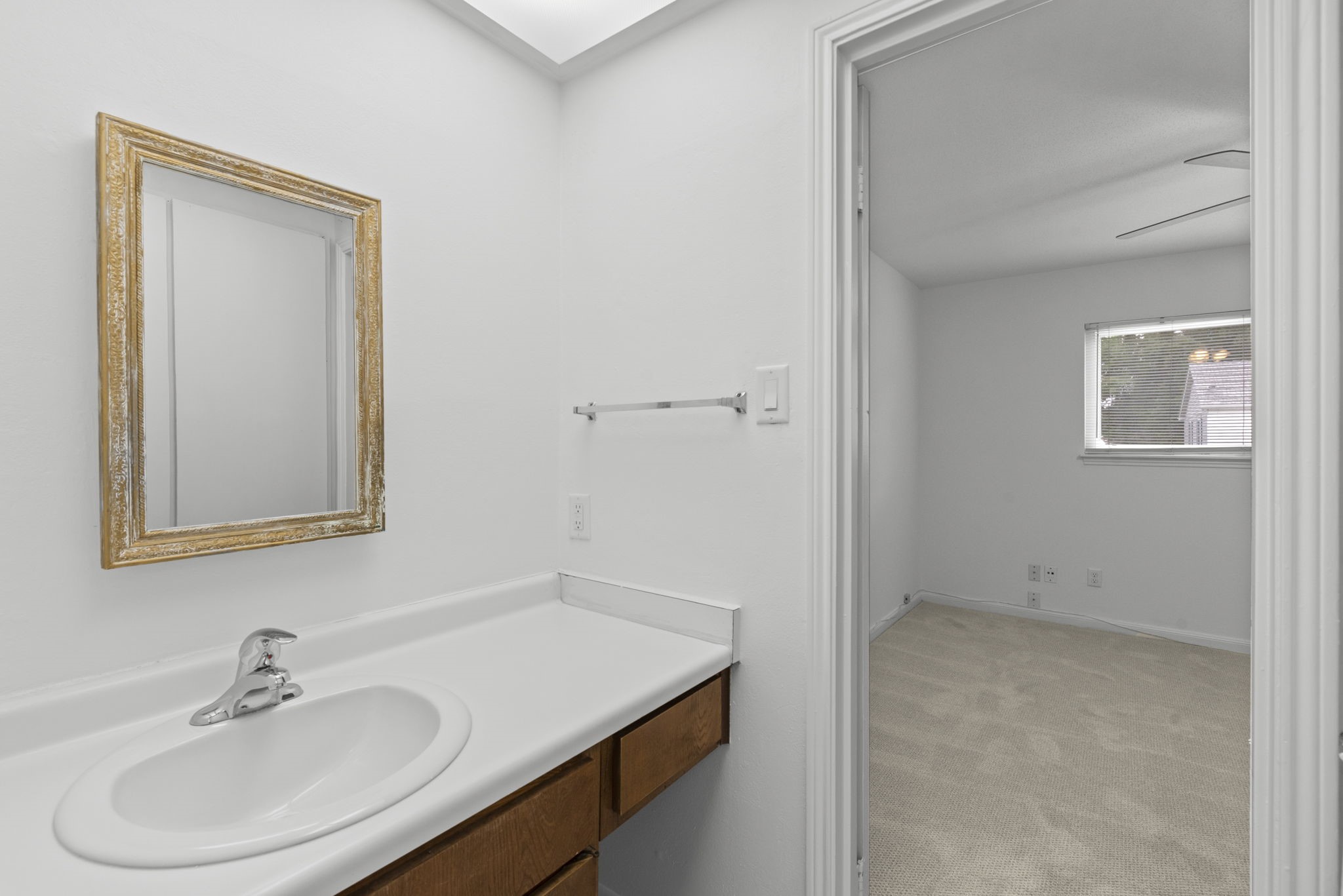 9668 Westview Drive, Unit 2 Houston, TX 77055 - Photo 22 of 34 a bathroom with a sink and a mirror