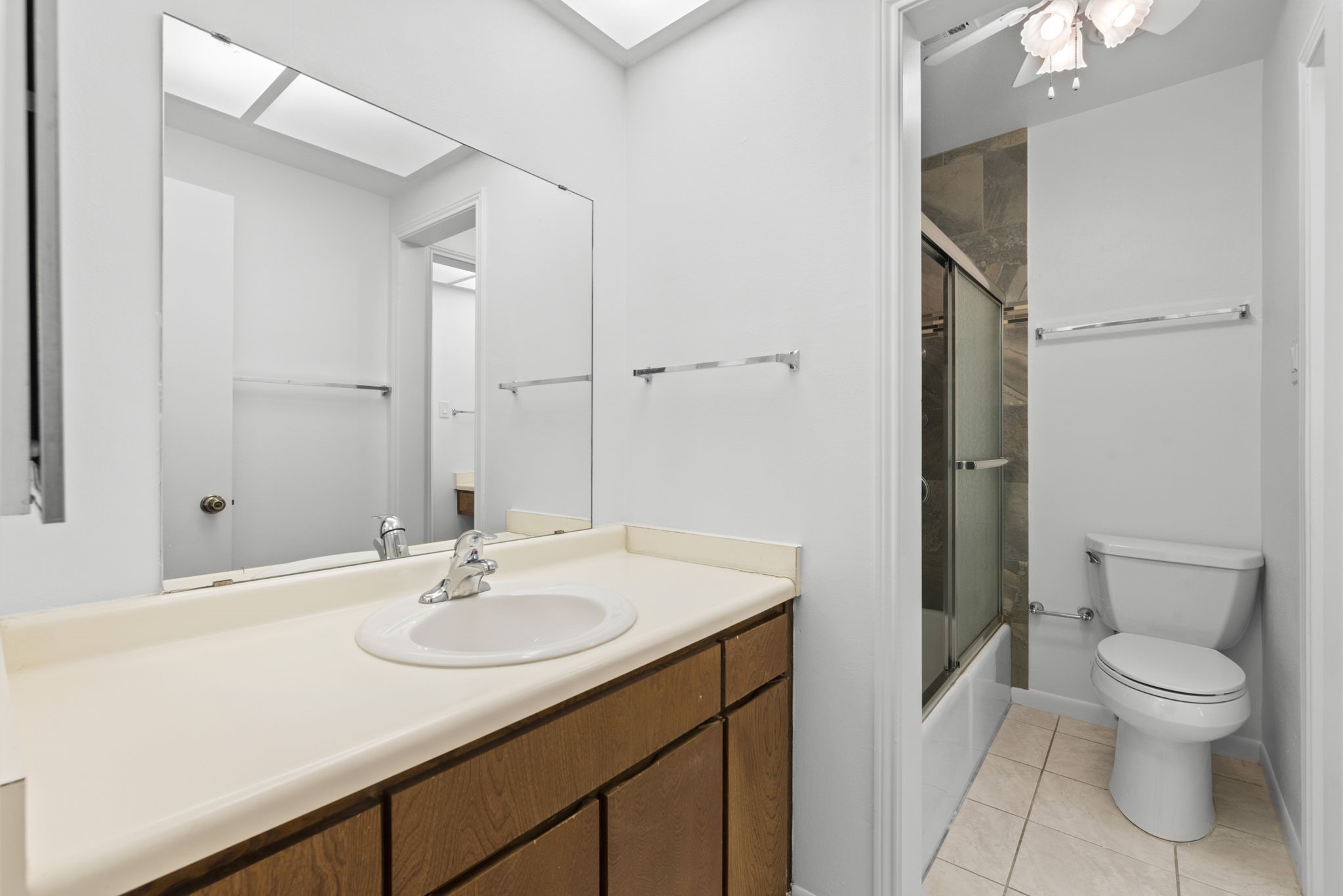 9668 Westview Drive, Unit 2 Houston, TX 77055 - Photo 24 of 34 a bathroom with a sink toilet and shower