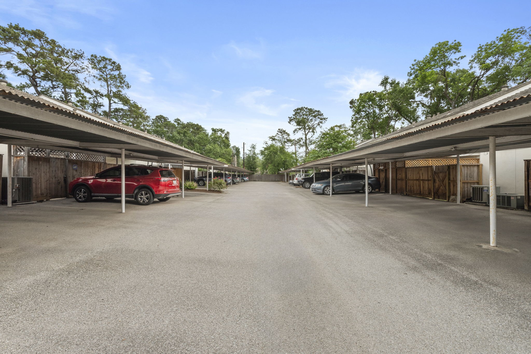 9668 Westview Drive, Unit 2 Houston, TX 77055 - Photo 33 of 34 a view of a house with a yard and sitting area