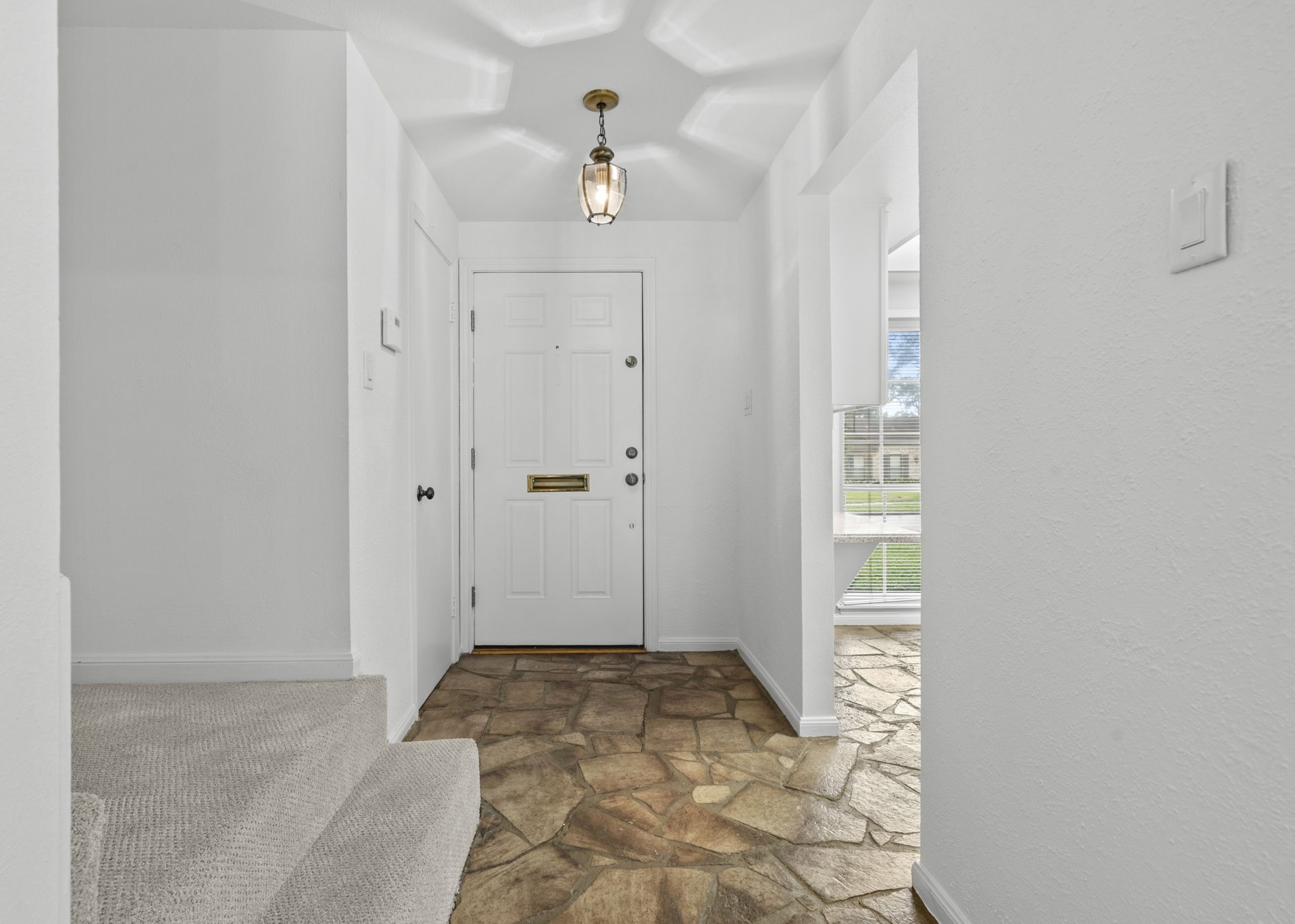 9668 Westview Drive, Unit 2 Houston, TX 77055 - Photo 8 of 34 a view of a bathroom with a sink and a mirror