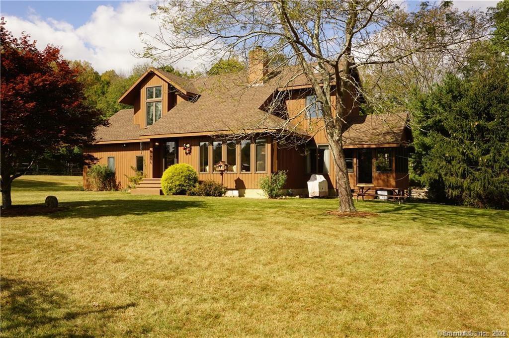 a front view of a house with swimming pool