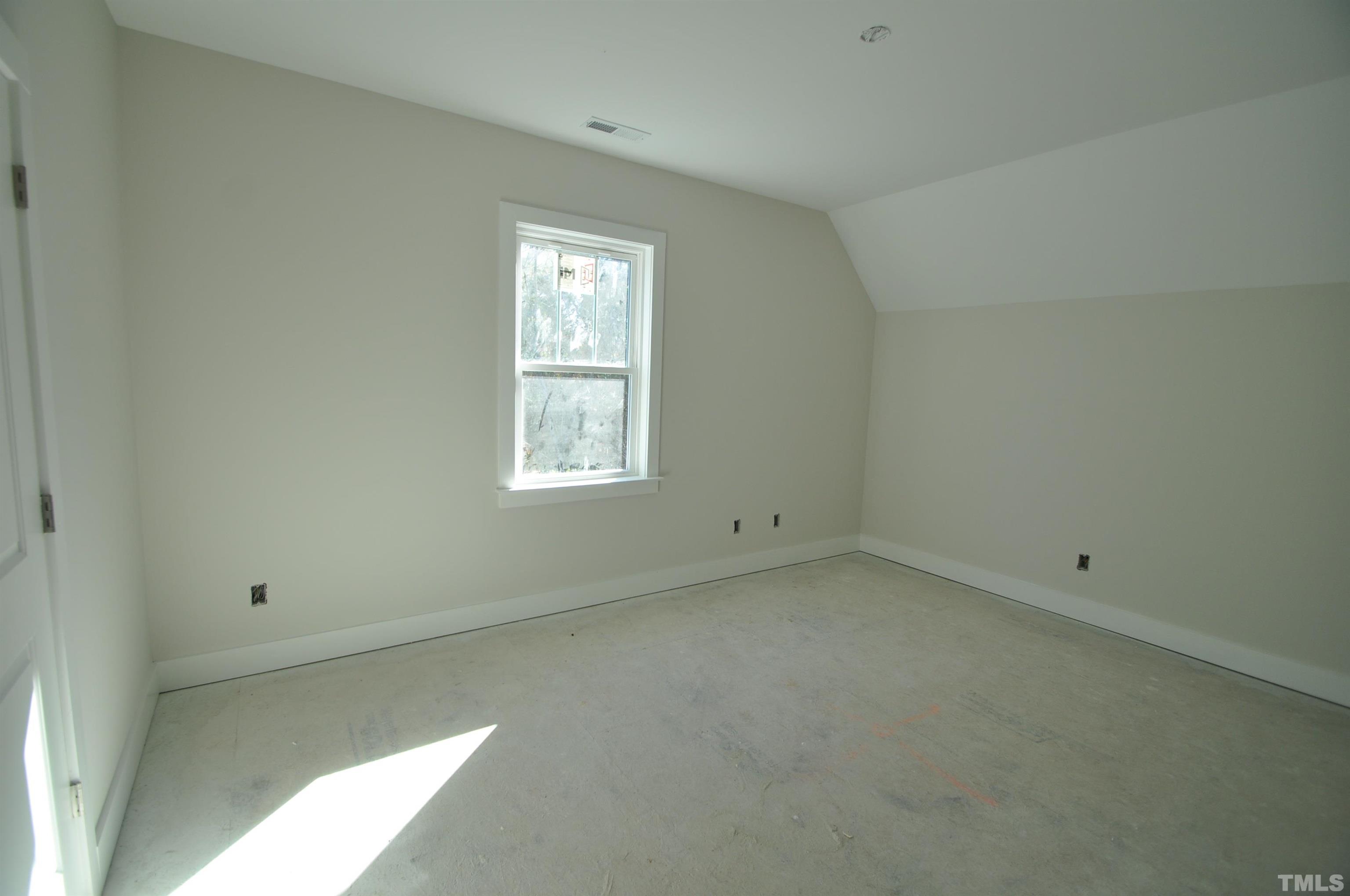 20 Pilot Ridge Road Zebulon, NC 27597 - Photo 11 of 14 an empty room with a window