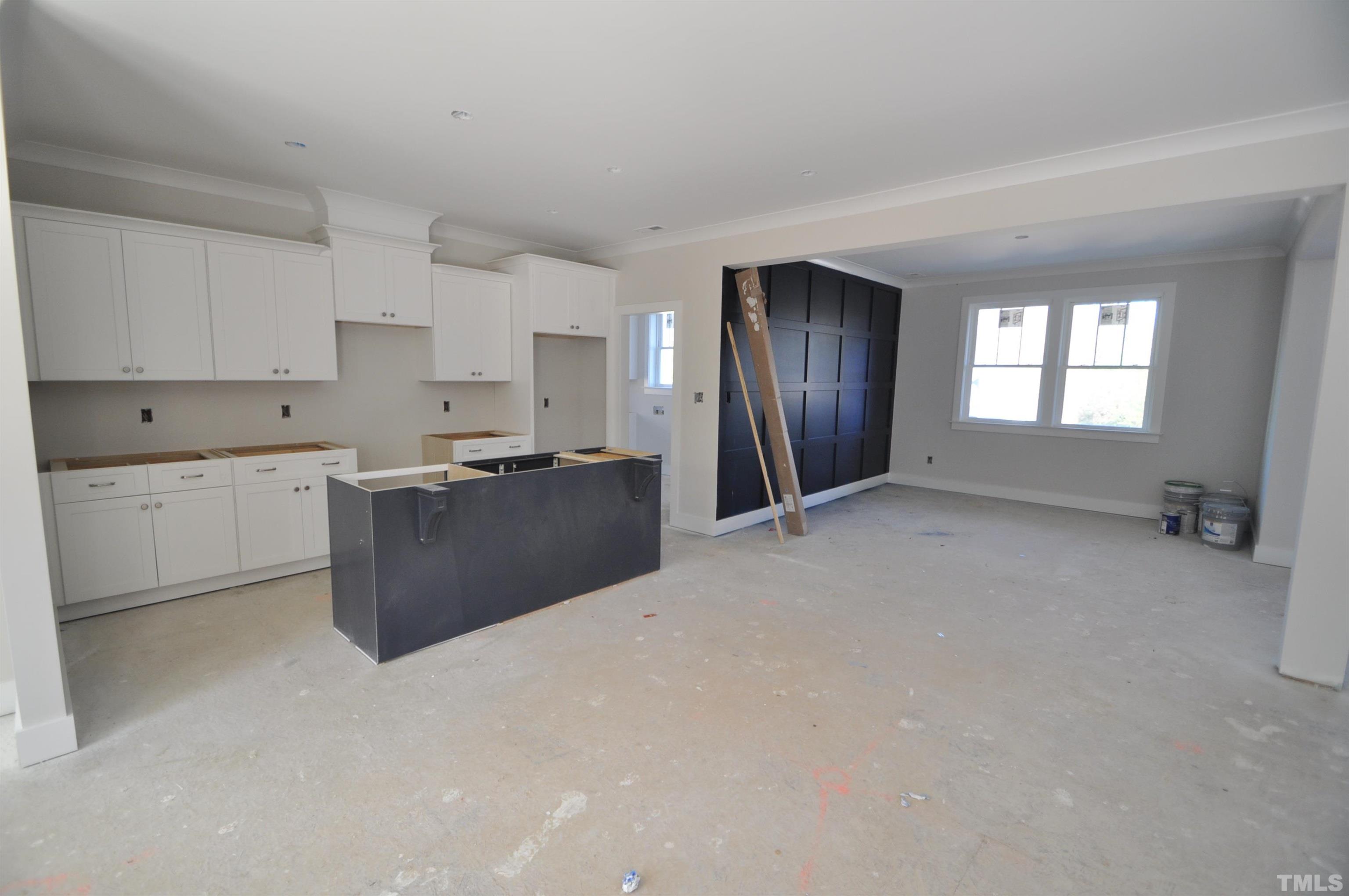 20 Pilot Ridge Road Zebulon, NC 27597 - Photo 4 of 14 a view of a kitchen with a sink cabinets and a window